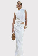 Vitt tvådelat set, lång linnekjol och ärmlös jacka