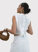 Vitt tvådelat set, lång linnekjol och ärmlös jacka