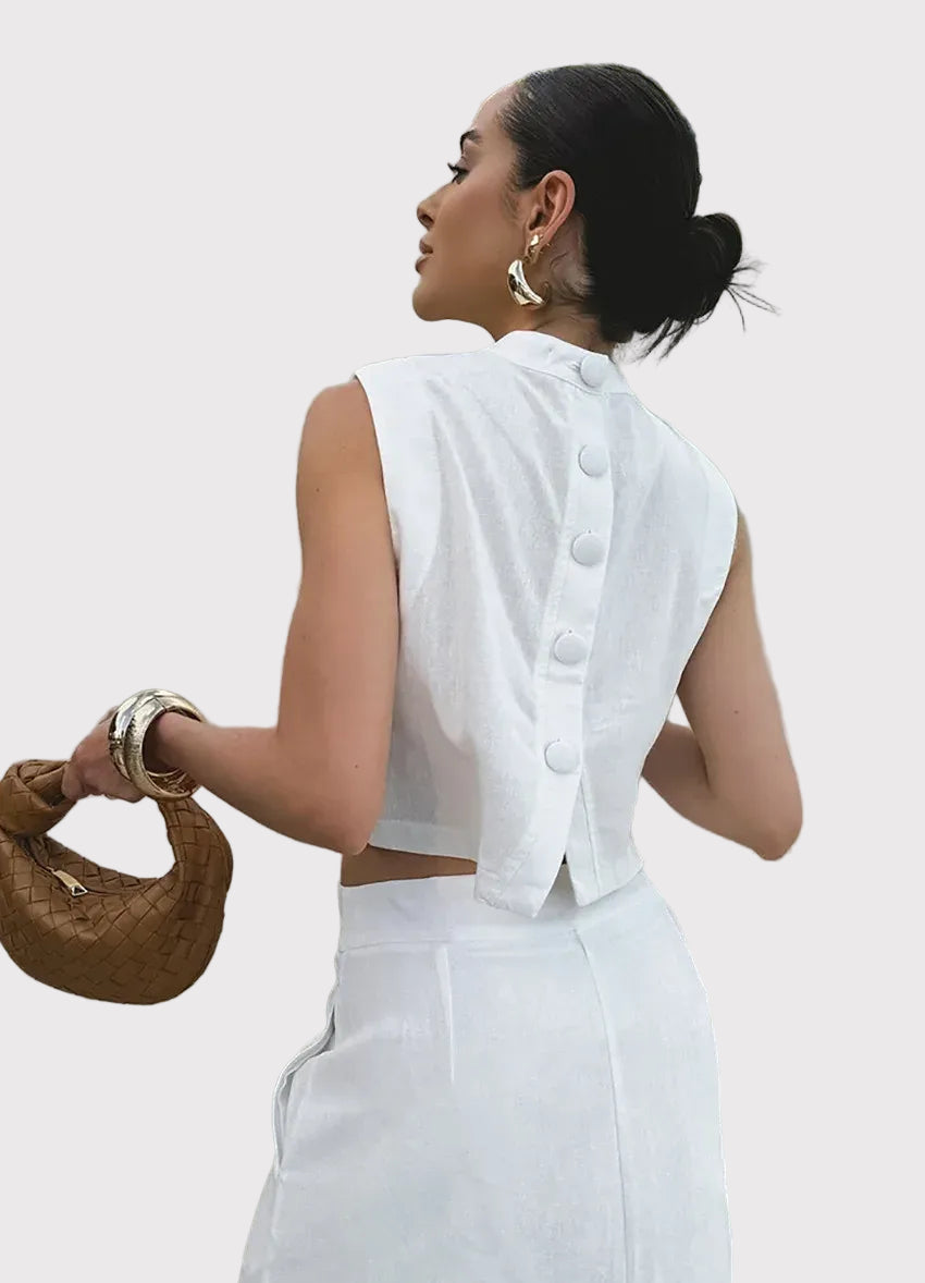 Vitt tvådelat set, lång linnekjol och ärmlös jacka