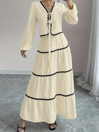 Vit kostym med lång kjol och blus över