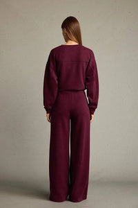 Veya sportdräkt med utsvängda byxor