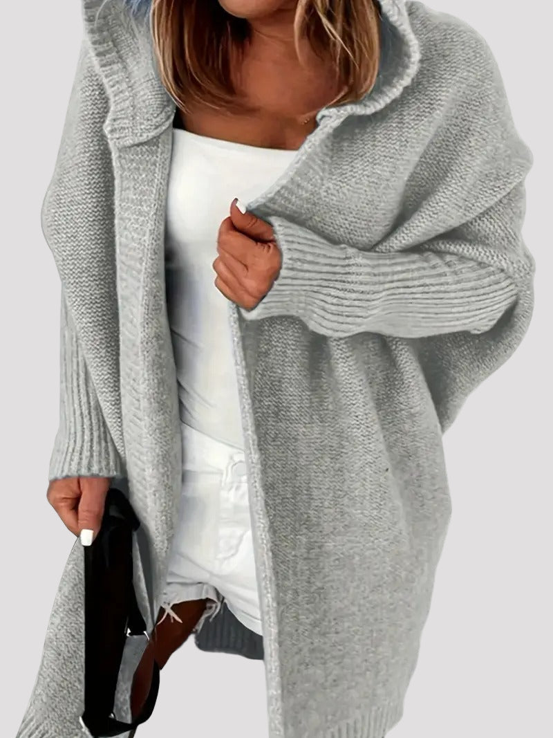 Långärmad kofta med stickad huva