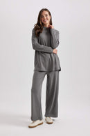 Elle Grå kostym med utsvängda byxor
