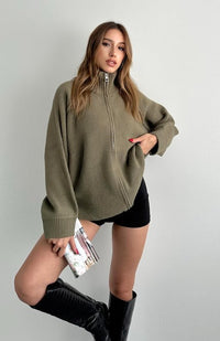 Liora lös blus med dragkedja och hög krage