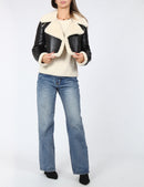 Långärmad, svart fleecefodrad jacka med korta slag