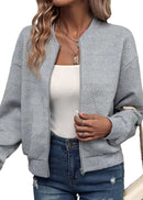 Grå stickad långärmad kofta med dekorativ dragkedja