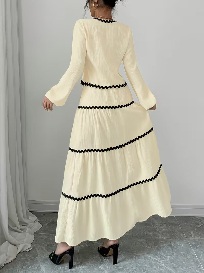 Vit kostym med lång kjol och blus över