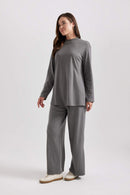 Elle Grå kostym med utsvängda byxor