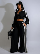 Tvådelad kostym med vita ränder