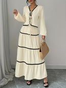 Vit kostym med lång kjol och blus över