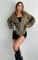 Liora lös blus med dragkedja och hög krage