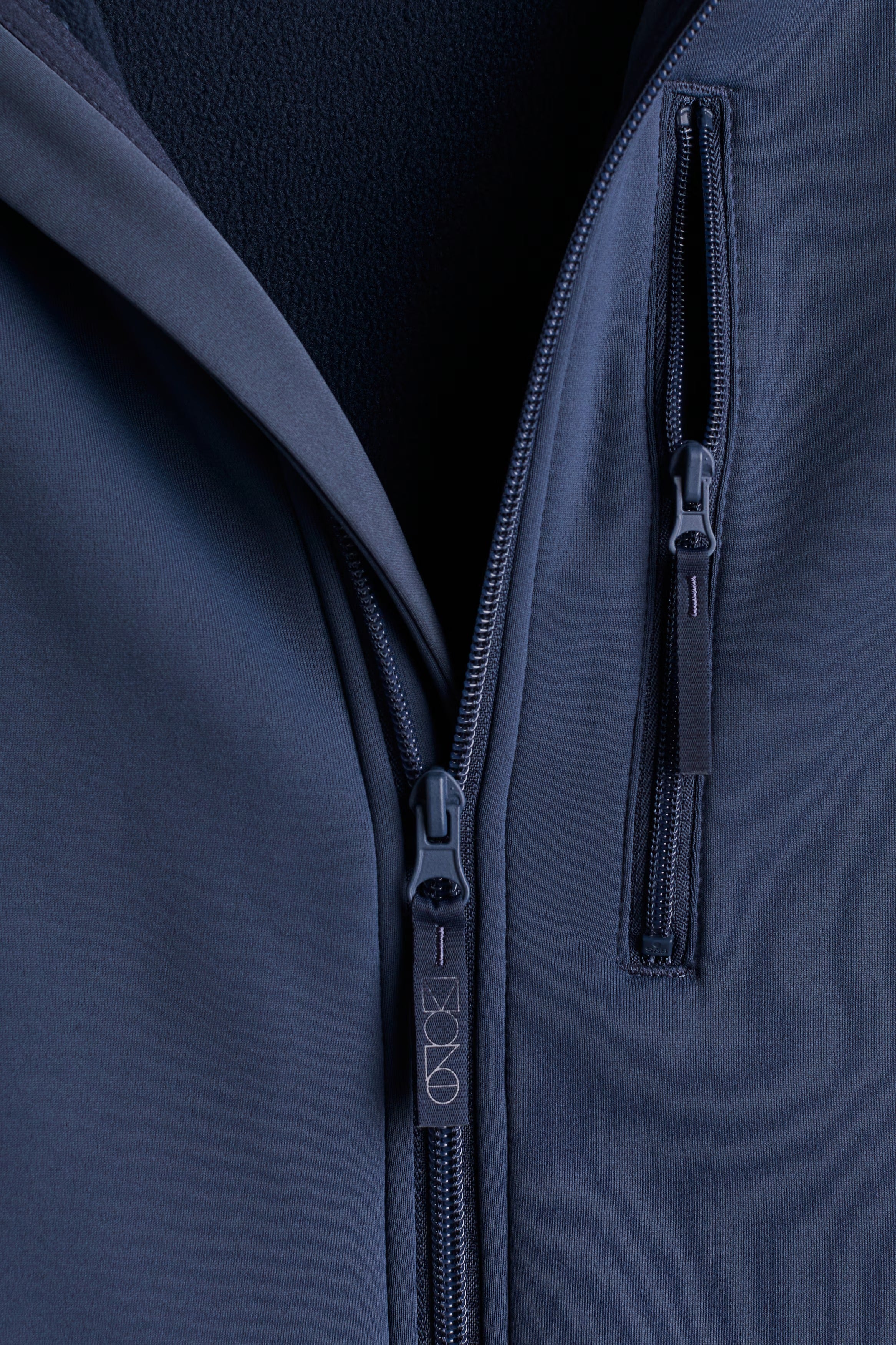 Eros jacka med dragkedja och huva, med fleece inuti