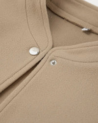 Elenya ljusbrun jacka med fleece inuti och knappar