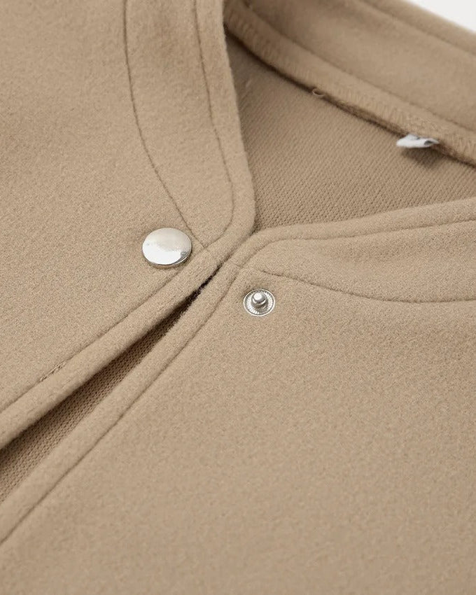 Elenya ljusbrun jacka med fleece inuti och knappar