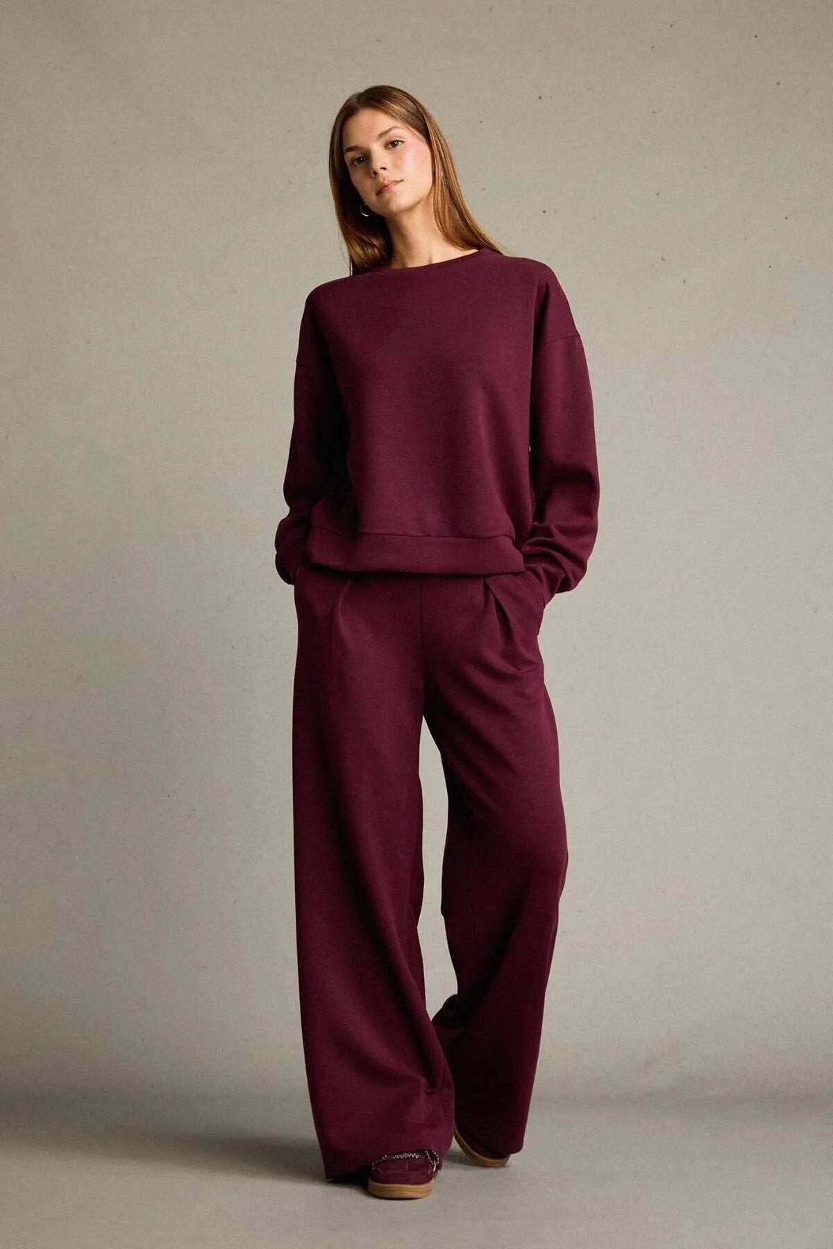 Veya sportdräkt med utsvängda byxor