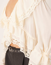 Adda gul skjorta med spetsvolanger