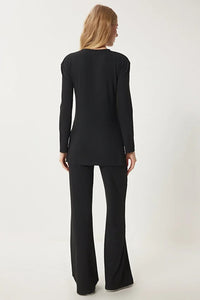 Tvådelad kostym med utsvängda byxor