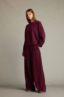 Veya sportdräkt med utsvängda byxor