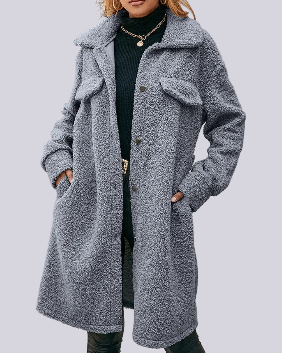 Lång kappa med knappar och två fickor
