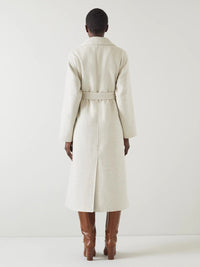 Ullkappa med dubbla rader knappar och skärp i midjan