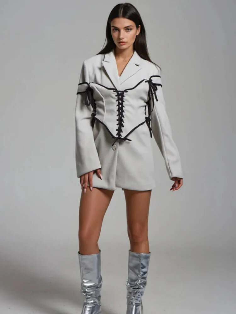 Långärmad jacka med knappar och korsett