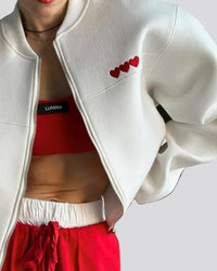 Tröja med hjärtbroderi, fleecefoder och dragkedja fram