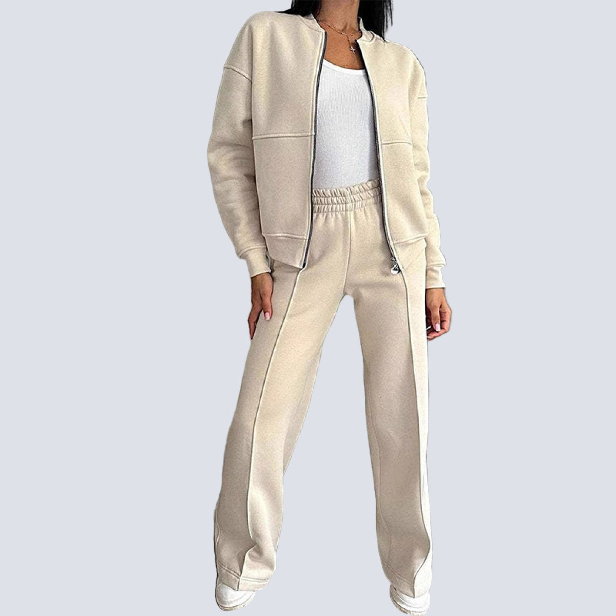 Tvådelat set, blus med dragkedja och randig design