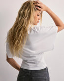 Clarra linne med fladdermusärm och rund krage