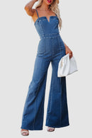 Ärmlös denimjumpsuit med V-ringning, utsvängda ben och dragkedja bak