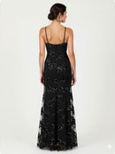 Svart Ala-klänning med V-ringning, axelband, öppen rygg och paljetter