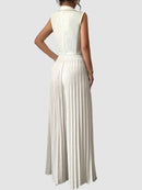 Tvådelad kostym, ärmlös kavaj och korta, utsvängda byxor