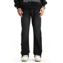 Svarta jeansbyxor med dragkedja nedtill