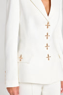 Vit tvådelad kostym med kavaj och byxor