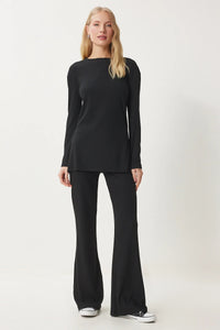 Tvådelad kostym med utsvängda byxor