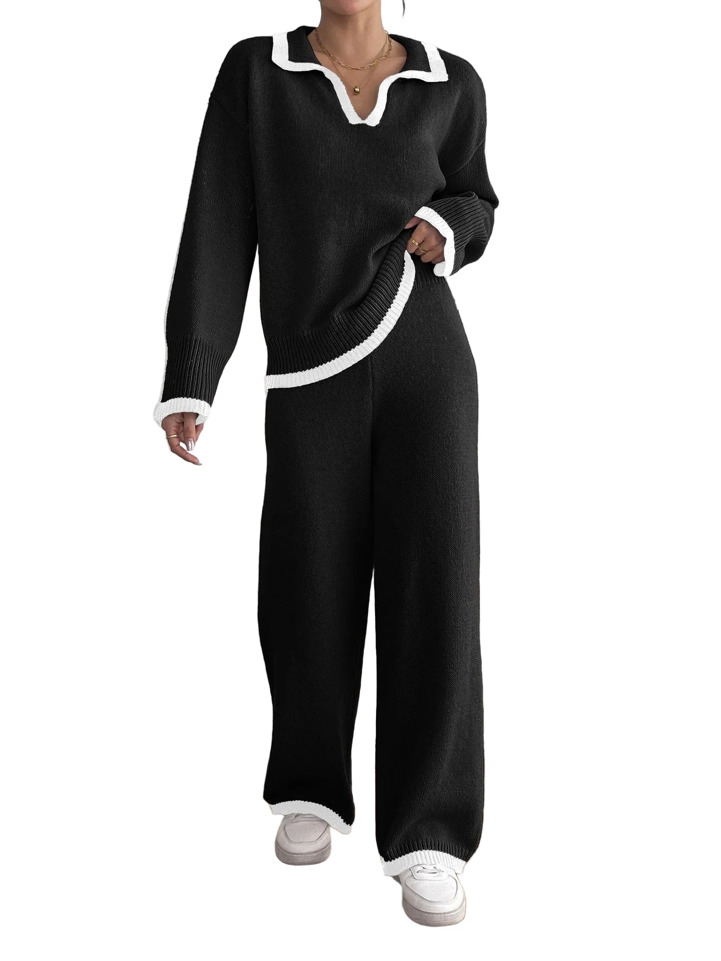 Tvådelat set med tröja och avslappnade byxor med vida ben