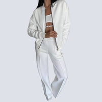 Tvådelat set, blus med dragkedja och randig design