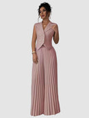 Tvådelad kostym, ärmlös kavaj och korta, utsvängda byxor