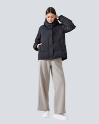 Allal jacka med dragkedja, knappar och fickor