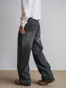 Svarta utsvängda jeansbyxor