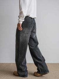 Svarta utsvängda jeansbyxor