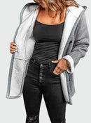 Emy jacka med knappar, huva och fickor