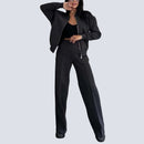 Tvådelat set, blus med dragkedja och randig design