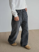 Svarta utsvängda jeansbyxor