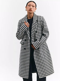 Lång jacka med svartvit rutig design