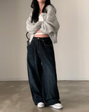 Grå tröja, stickad och med knappar