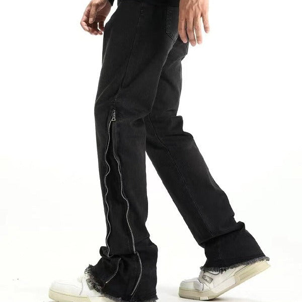 Svarta jeansbyxor med dragkedja nedtill