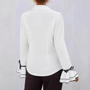 Avslappnad blus med utsvängda ärmar och vågig krage