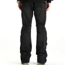 Svarta jeansbyxor med dragkedja nedtill