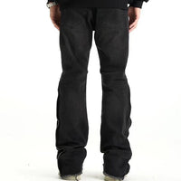 Svarta jeansbyxor med dragkedja nedtill