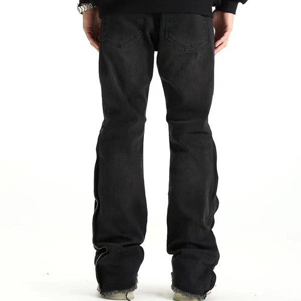 Svarta jeansbyxor med dragkedja nedtill